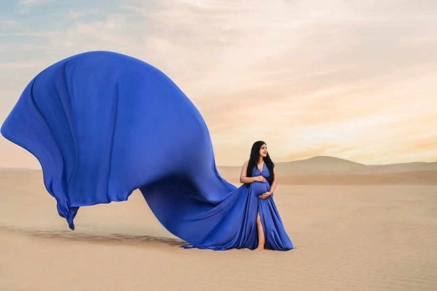 Capturing the Miracle During a Maternity Flying Dress Photoshoot in Dubai