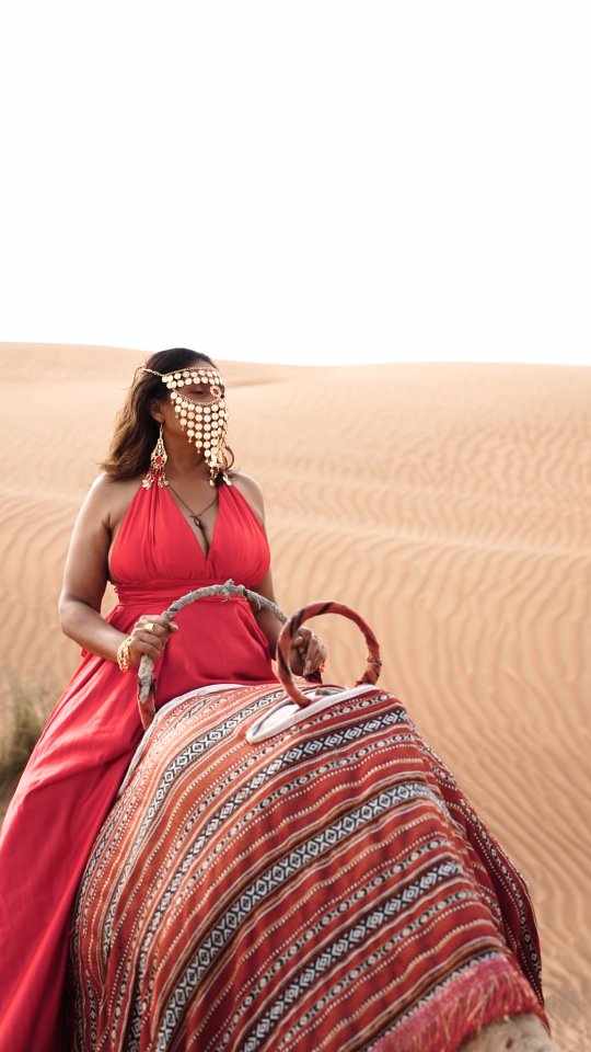 Flying Dress Abu Dhabi with Camel Ride: The Ultimate Desert Photoshoot Experience