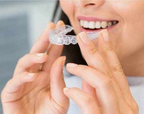 Who provides Invisalign treatment in Dover for teens and adults?