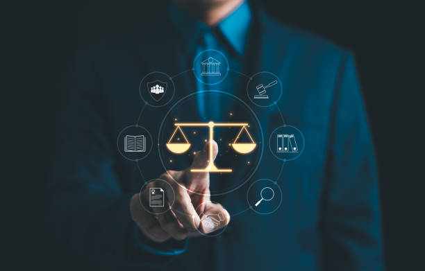 Legal Professional with Justice Icons. A suited legal professional touches virtual icons symbolizing law, justice, and legal services. business legislation, Notary public, legal advice online, Lawyer Legal Professional with Justice Icons. A suited legal professional touches virtual icons symbolizing law, justice, and legal services. business legislation, Notary public, legal advice online, Lawyer Privacy compliance law stock pictures, royalty-free photos & images