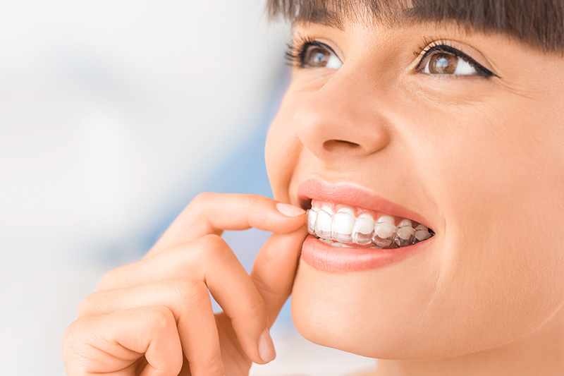 How Do Implants Improve Oral Health and Restore Smile Appearance
