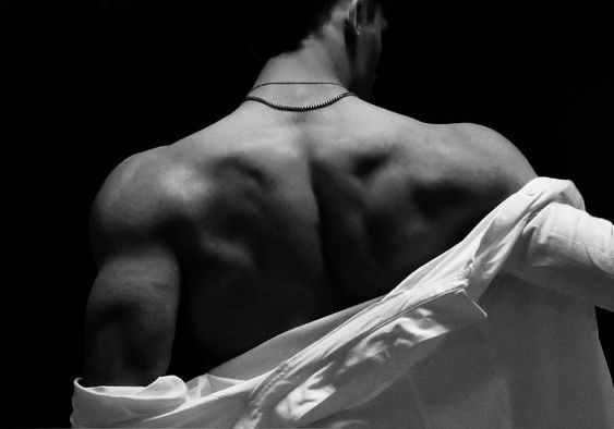 I watched him as he casually removed his shirt, his broad shoulders and strong frame suddenly revealed