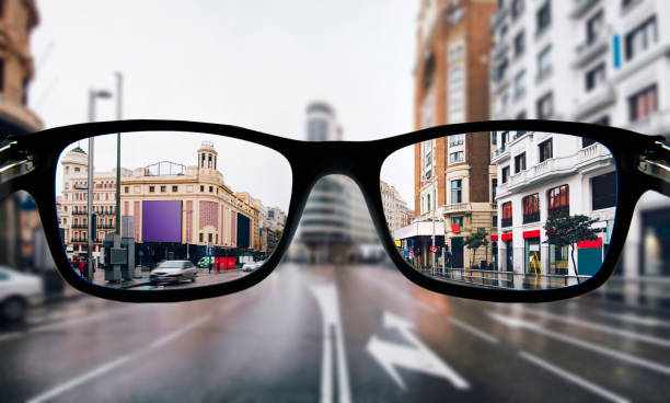 Myopia in Madrid The city center of Madrid as seen from some myopia glasses. lens for myopia stock pictures, royalty-free photos & images