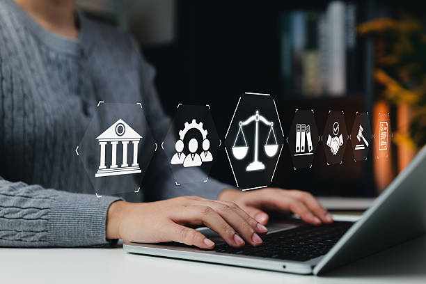 Law and Justice Concept. Legal professional using latop with icons symbolizing law, justice, legal services. lawyer, business legislation, notary public, law firm, online legal advice, practice of law Law and Justice Concept. Legal professional using latop with icons symbolizing law, justice, legal services. lawyer, business legislation, notary public, law firm, online legal advice, practice of law Privacy compliance services stock pictures, royalty-free photos & images