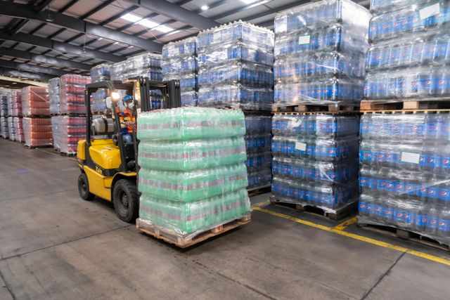Push Back Rack: Comparing Carts and Rails in Deep Lane Storage Systems