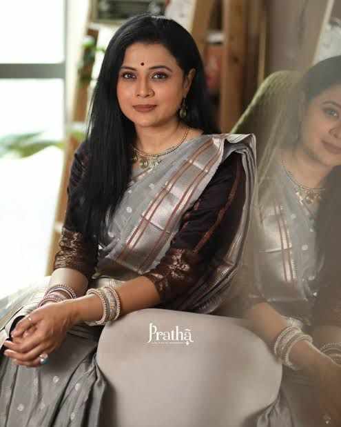 48-year-old, house wife of Janak, is the true heart of the household, known for her gentle nature, warmth, and endless compassion