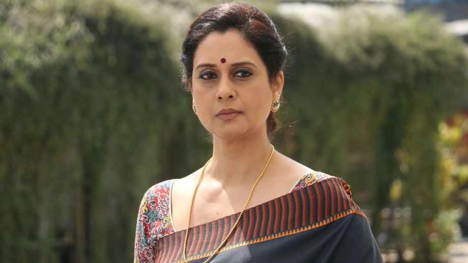 48- years- old, widowed mother of Rishi and mother-in-law of Shanta