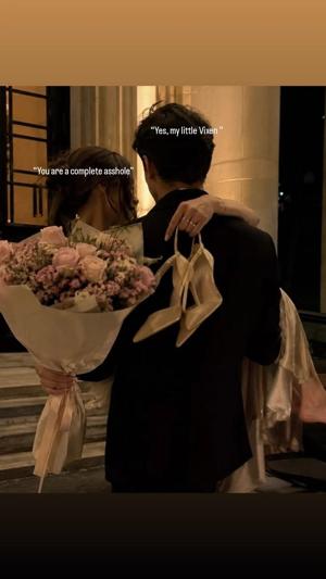 In his arms