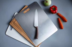How Do Different Cutting Boards Affect Food Safety and Maintenance?