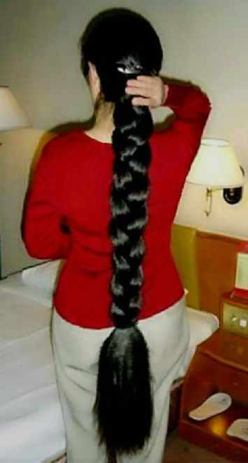 She flushed under their amused stares