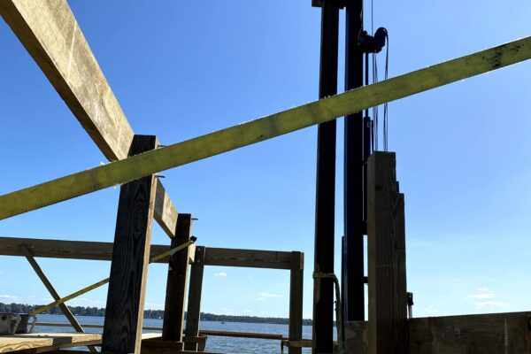 The Power Beneath the Waves: How Pile Driving Contractors Strengthen Waterfront Structures