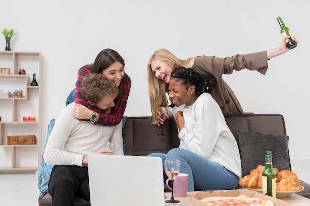 Friends eating at home