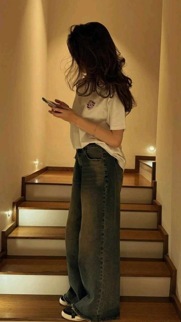 She had just changed into her comfy jeans and white t-shirt