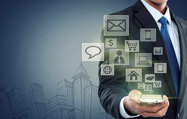 Businessman using smartphone with icons