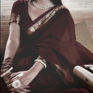 A maroon Saree
