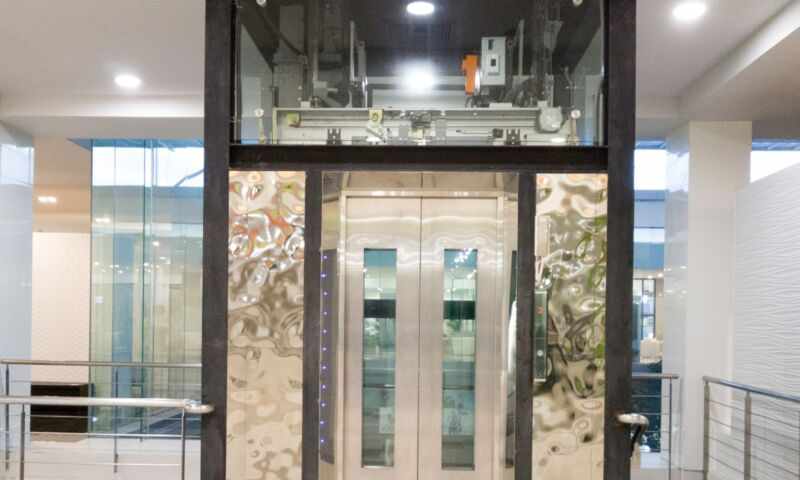 Why do some elevator brands rely more on luxury features?