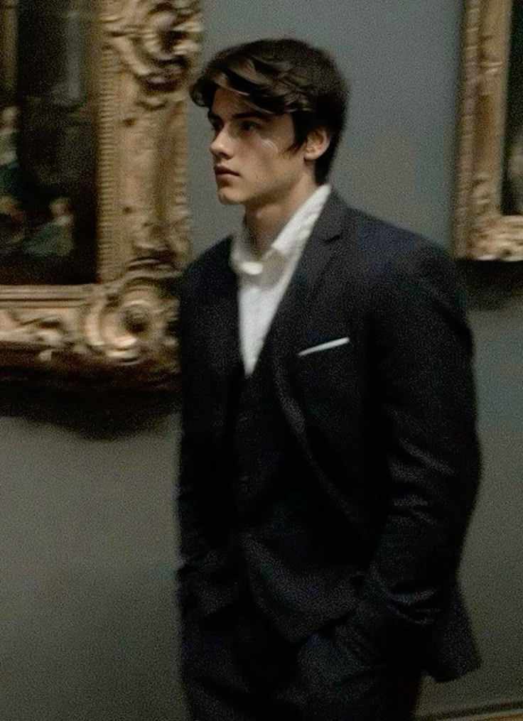 He was a god of shadows and whispers, both alluring and a little dangerous