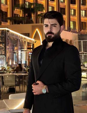 Raja Saheb's brown eyes