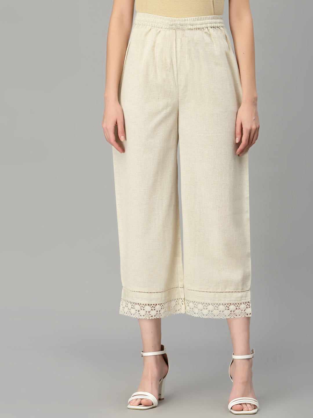 Make a Statement Wearing an Elegant Off White Palazzo Pant This Summer