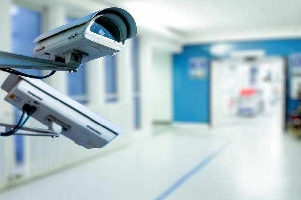 CCTV Security Camera operating in hospital The CCTV Security Camera operating in hospital blur background. cctv stock pictures, royalty-free photos & images