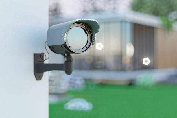 Exterior Of A Villa With Security Camera Exterior Of A Villa With Security Camera. 3d Render cctv surviellance stock pictures, royalty-free photos & images
