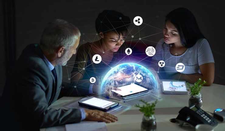 Business people tablet and cryptocurrency economy stock market hologram or global forex data in dark office Diversity workers trading on digital technology fintech investment or worldwide overlay