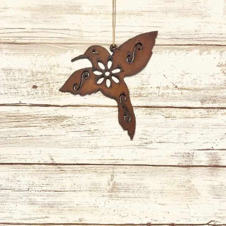 Rustic hummingbird garden ornament, handcrafted metal wall art for outdoor decor in the USA