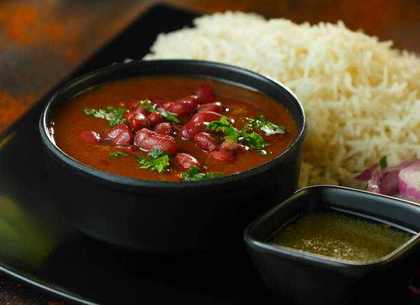 Rajma Chawal - an indian food Rajma chawal- typical north Indian main course, kidney bean curry and boiled rice Dhaba resturent stock pictures, royalty-free photos & images