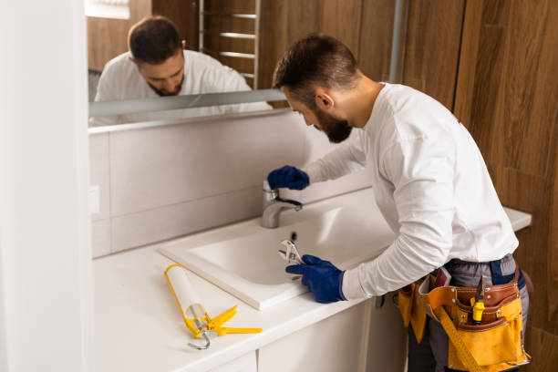 plumber service. wash basin installation plumber service. wash basin installation.  Professionals for Kitchen and Bathroom Upgrades stock pictures, royalty-free photos & images
