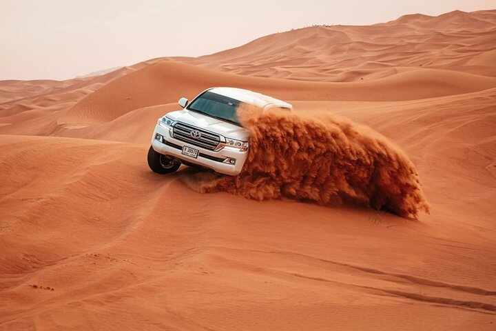 Desert Safari Dubai with 4x4 Dune Bashing, Camel Ride & BBQ Dinner Under The Stars