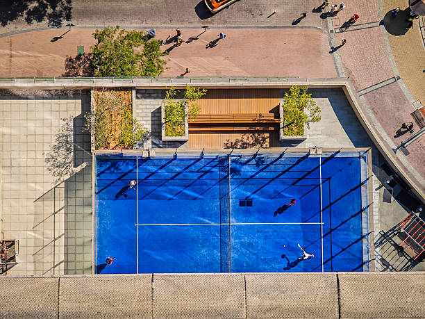 Padel court from above. Aerial view of padel tennis court from balcony Padel court from above. Aerial view of padel tennis court from balcony of skyscraper. Padel court in Dubai Marina padel court aerial view stock pictures, royalty-free photos & images