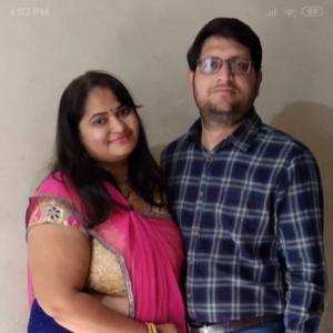 Divya Nilesh Modi logo