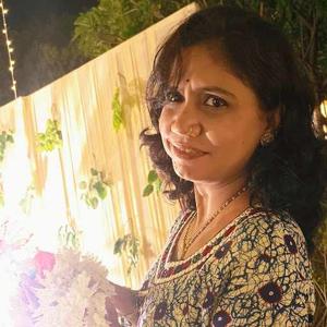 Sunita Rajnishkumar Joshi logo