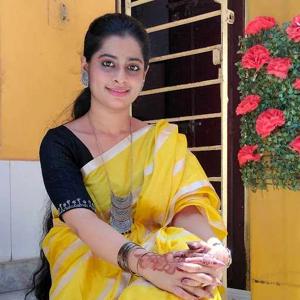 Esha Bhattacharya logo