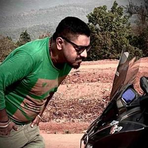 Chinmay Korgaokar logo