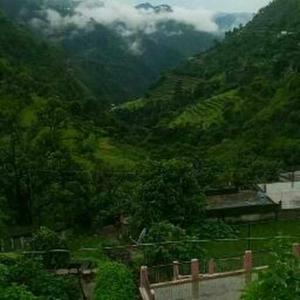 Komal Rawat Rawat logo