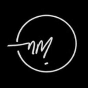 Nivedita Merchant logo