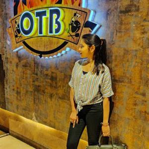 Tanisha Maheshwari logo