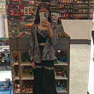 Dhanashree Mhatre logo