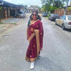 Komathi Thamotharan logo